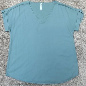 V neck shirt sleeved top in light sage green size XL